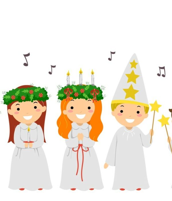 dzieci trzymające świece i śpiewające kolędy